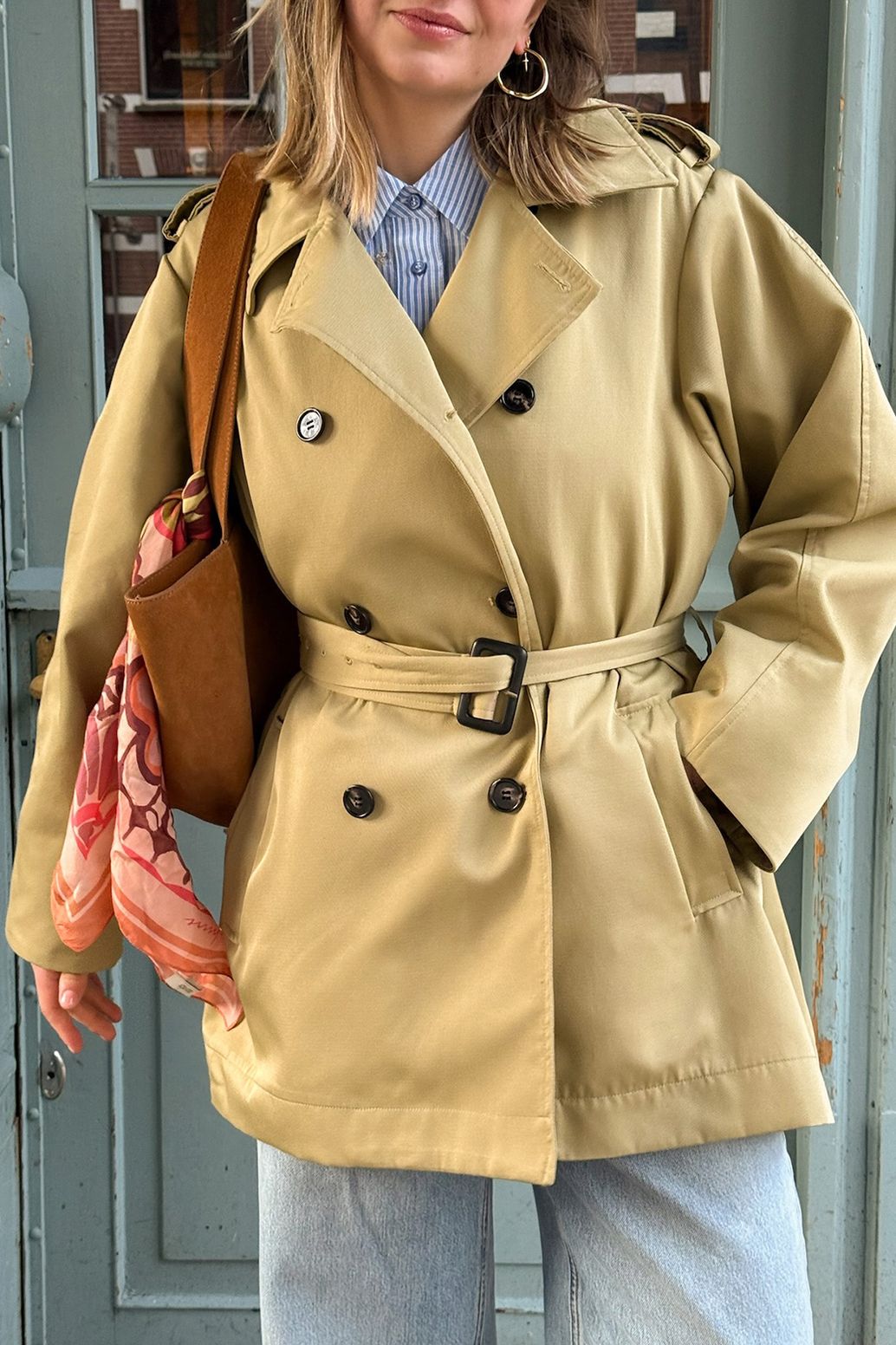 Lichtgroene trenchcoat