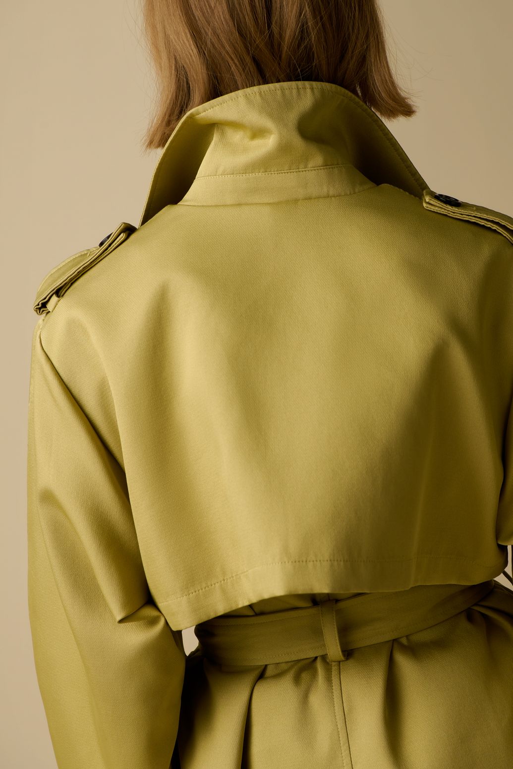 Lichtgroene trenchcoat