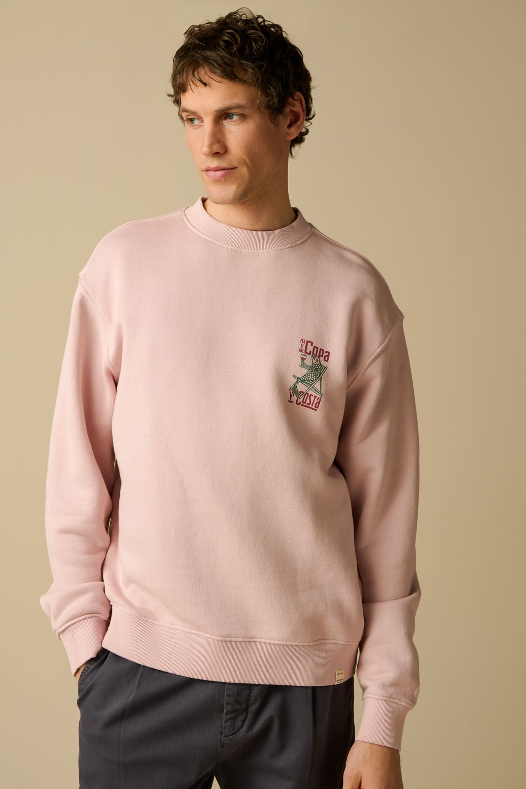 Lichtroze sweater met artwork