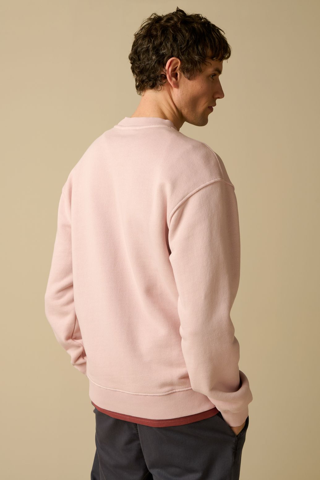 Lichtroze sweater met artwork