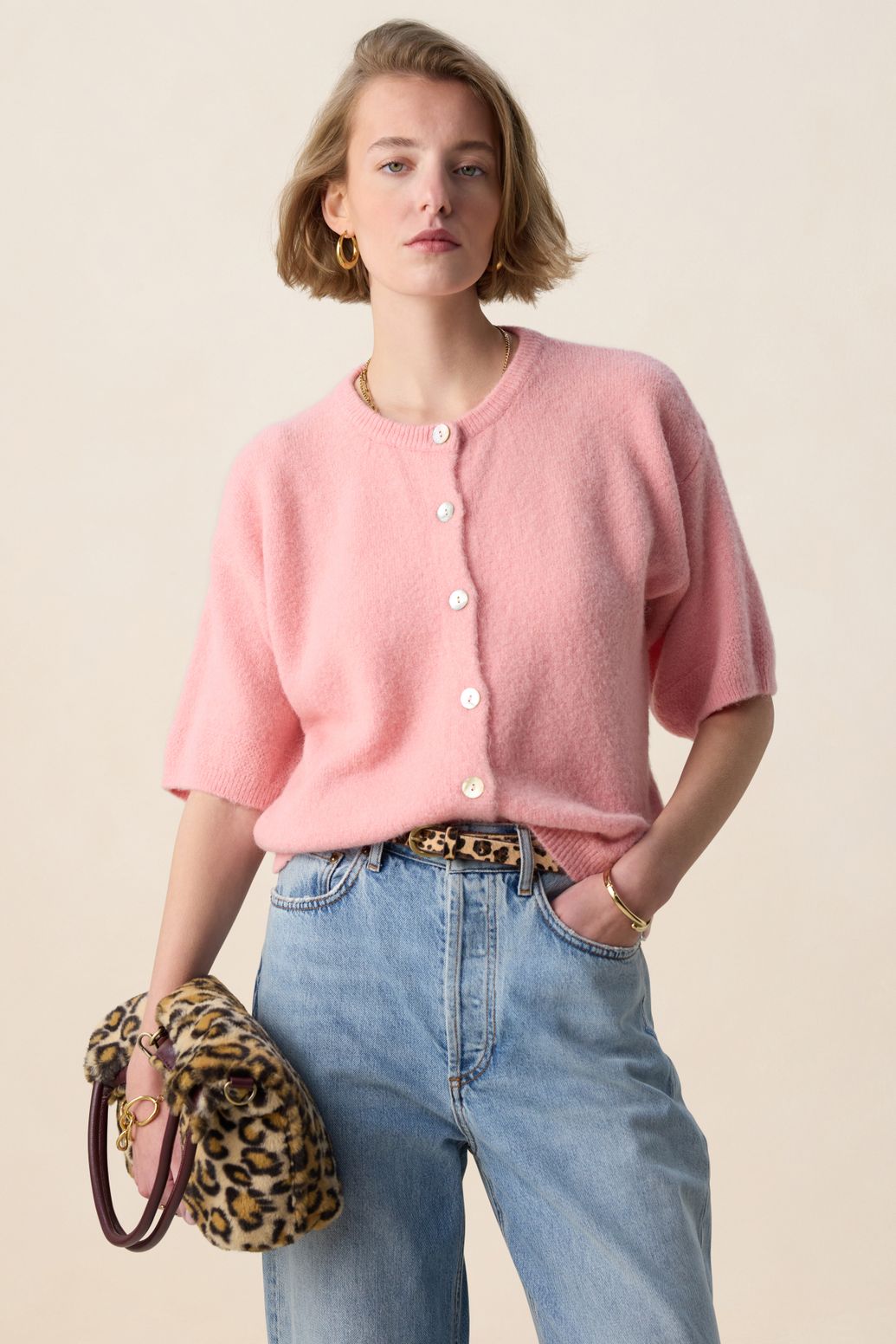 Lichtroze gebreid vest