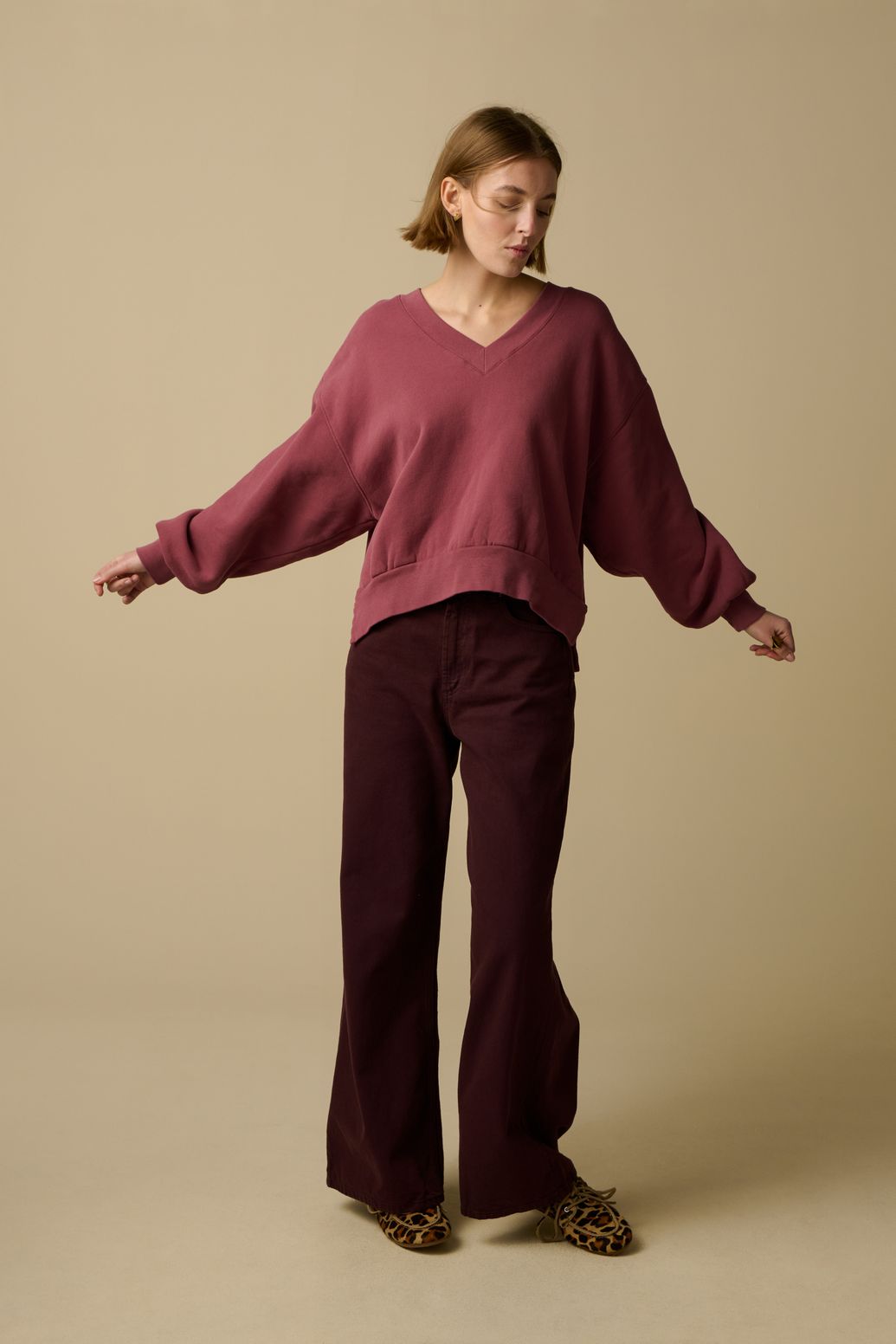 Donkerroze v-hals sweater