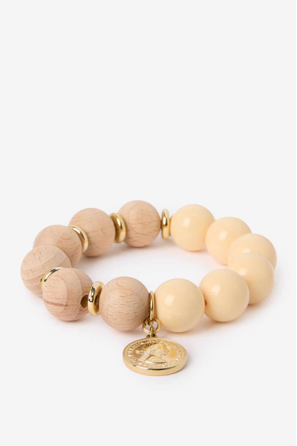 Beige kralen armband met munt