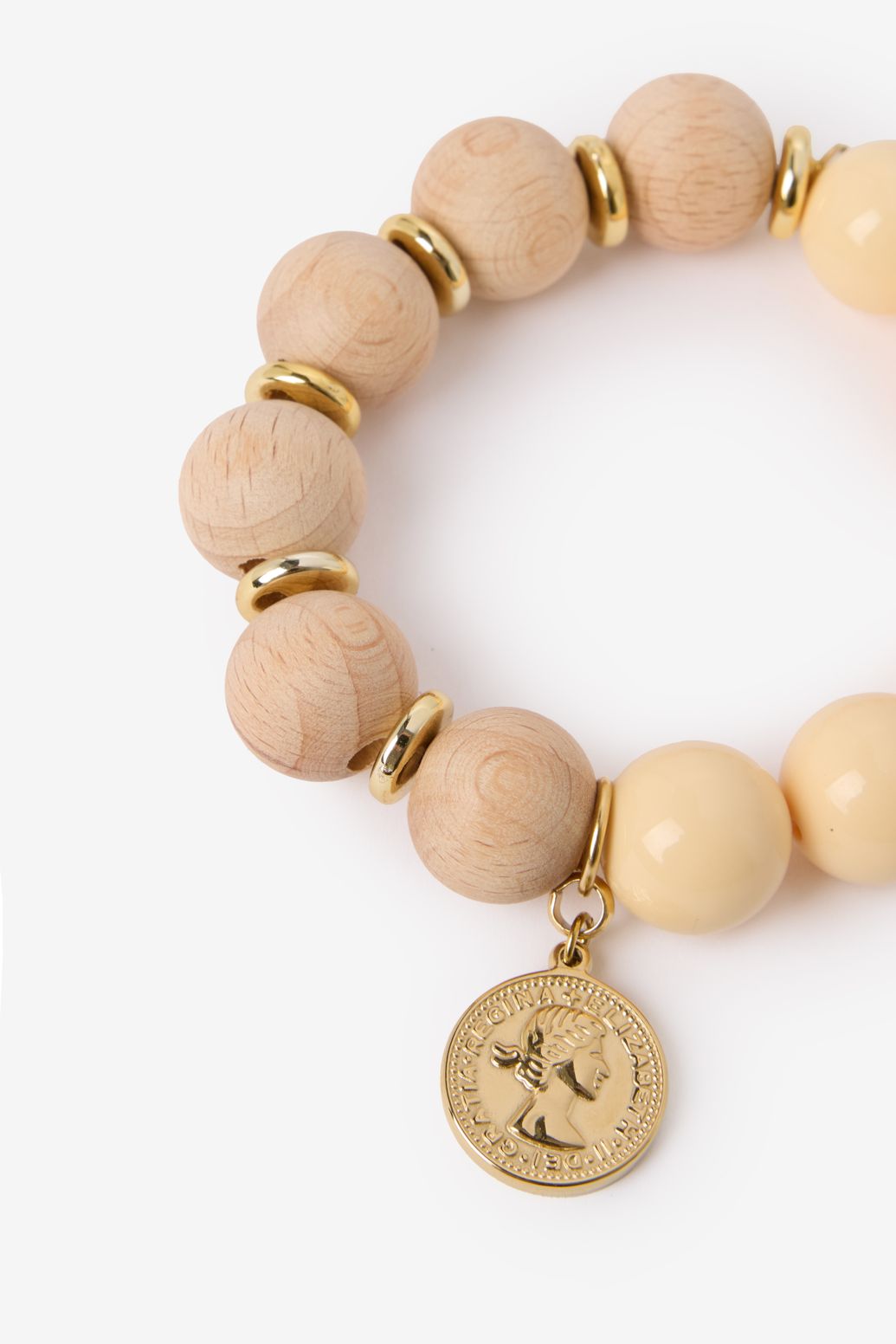 Beige kralen armband met munt