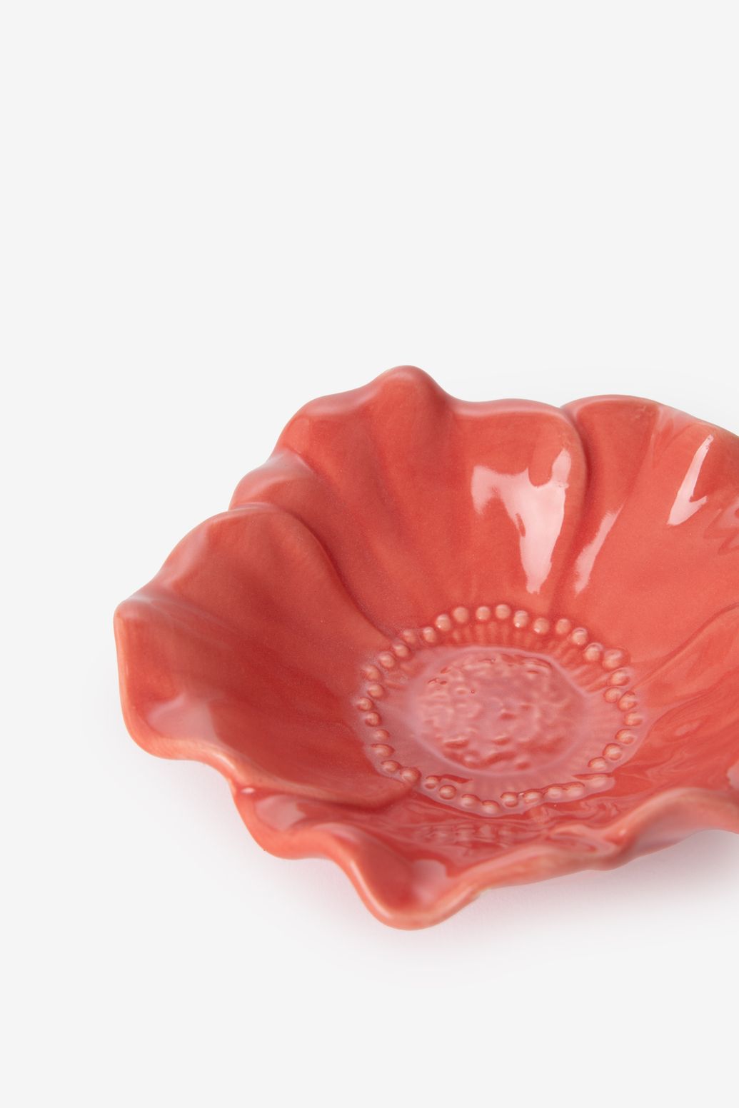 Lichtrode bloemen kom