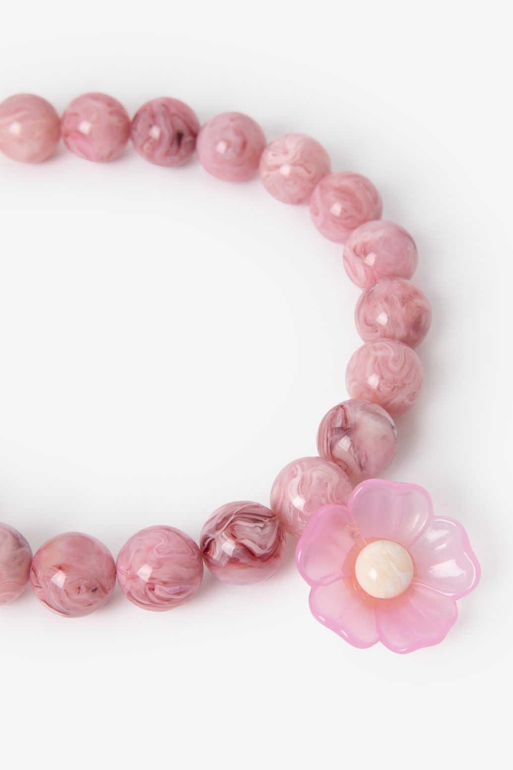 Roze resin kralenketting met bloem