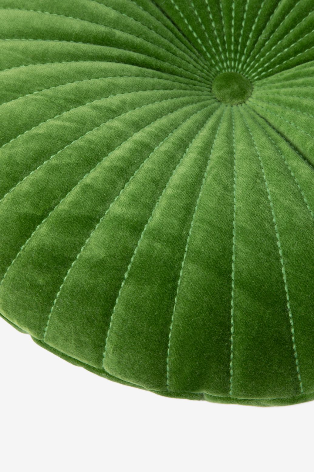 groen rond velvet kussen