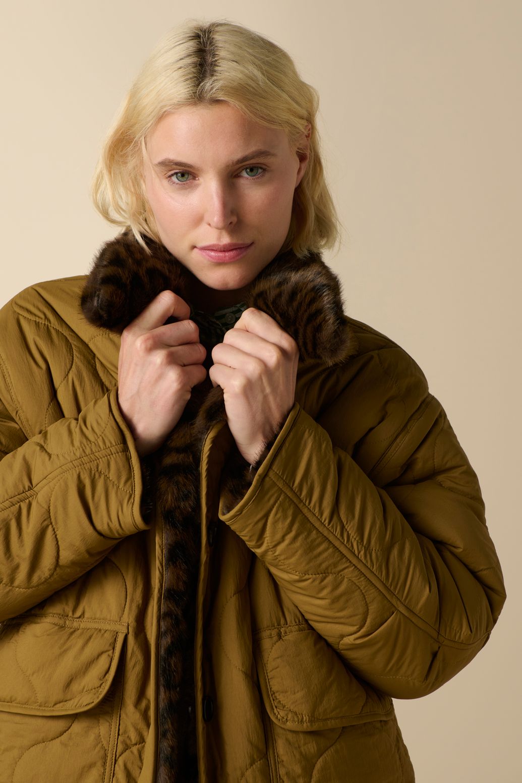 Donkerbruine reversible faux fur jas