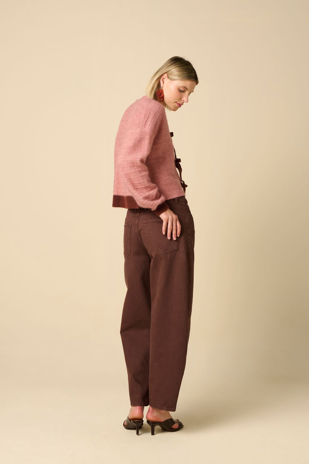 Roze wollen vest met striksluiting