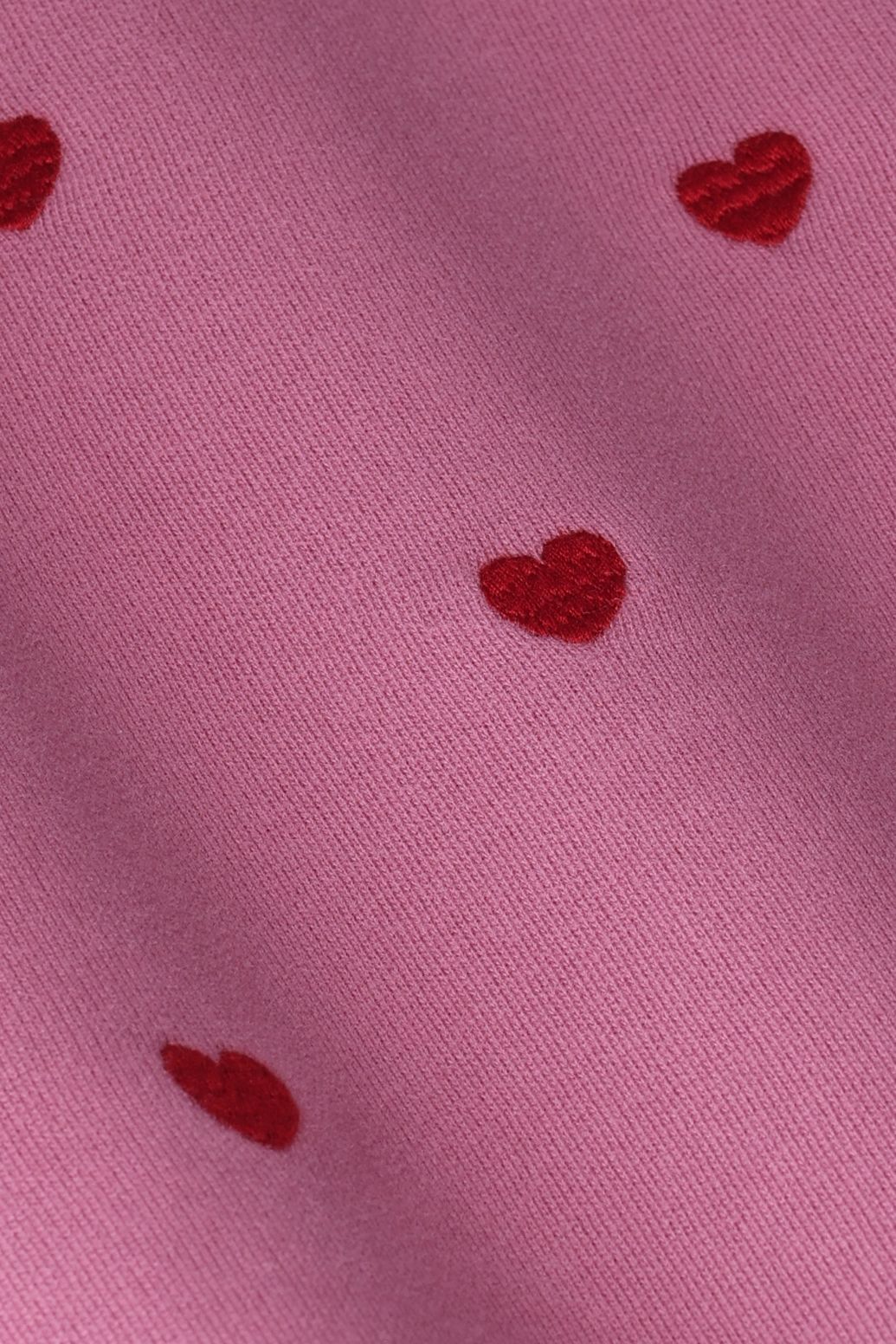 Paarse sweater met hartjes
