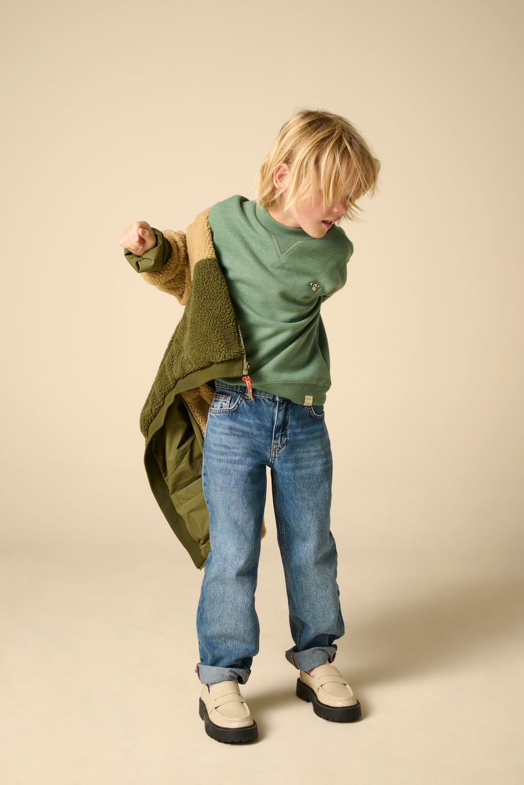 Donkergroene sweater met embroidery