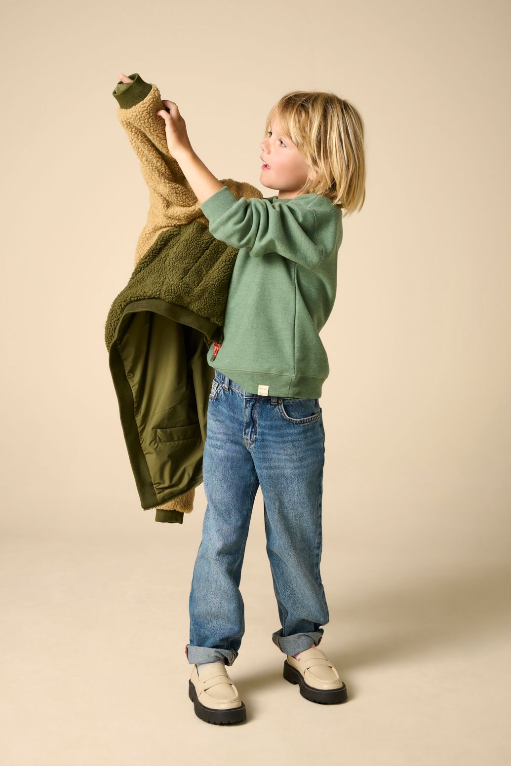 Donkergroene sweater met embroidery