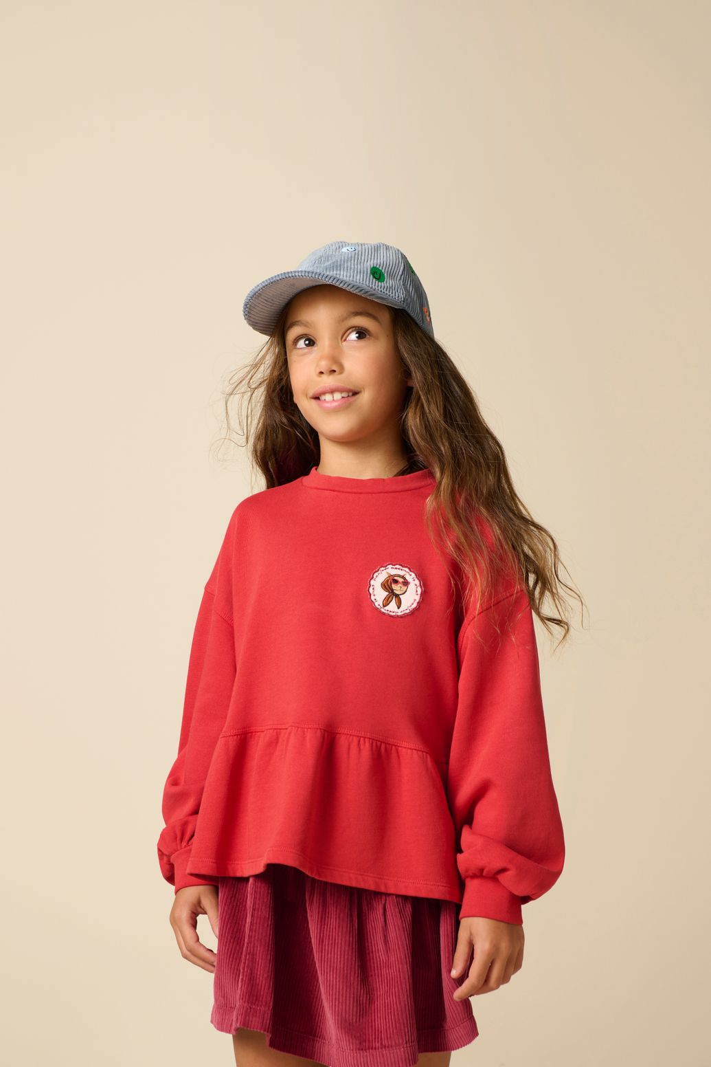 Rode sweater met peplum