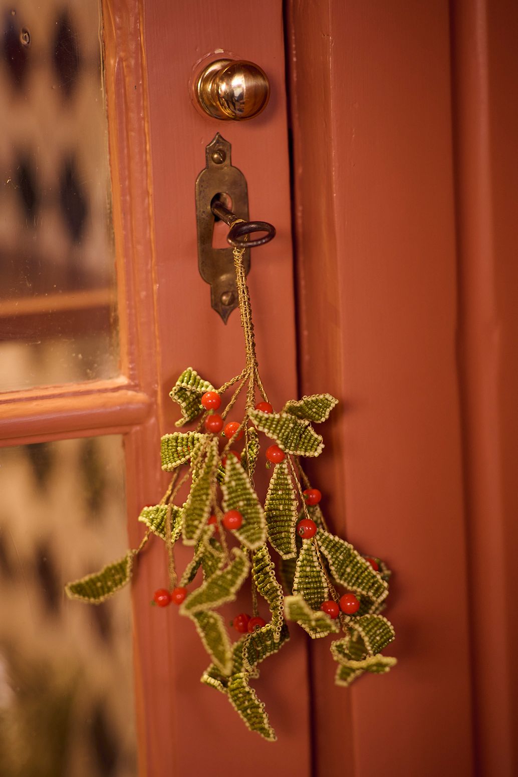 Weihnachtsschmuck Zweig mit roten Beeren