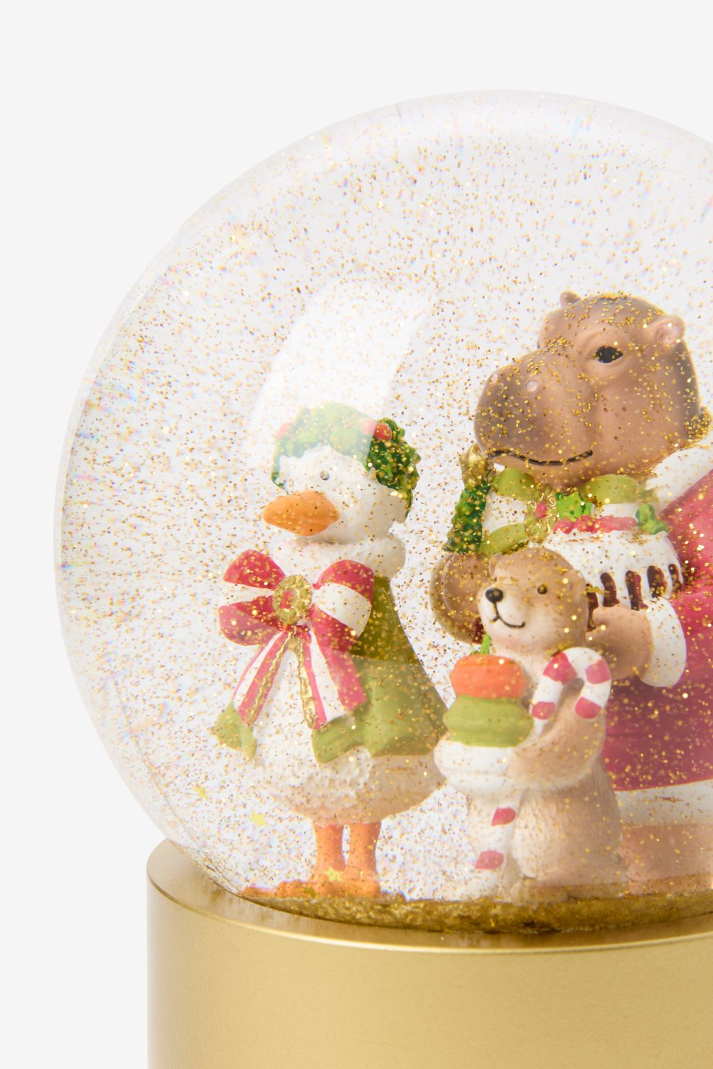 Glazen sneeuwbol met kerstdieren