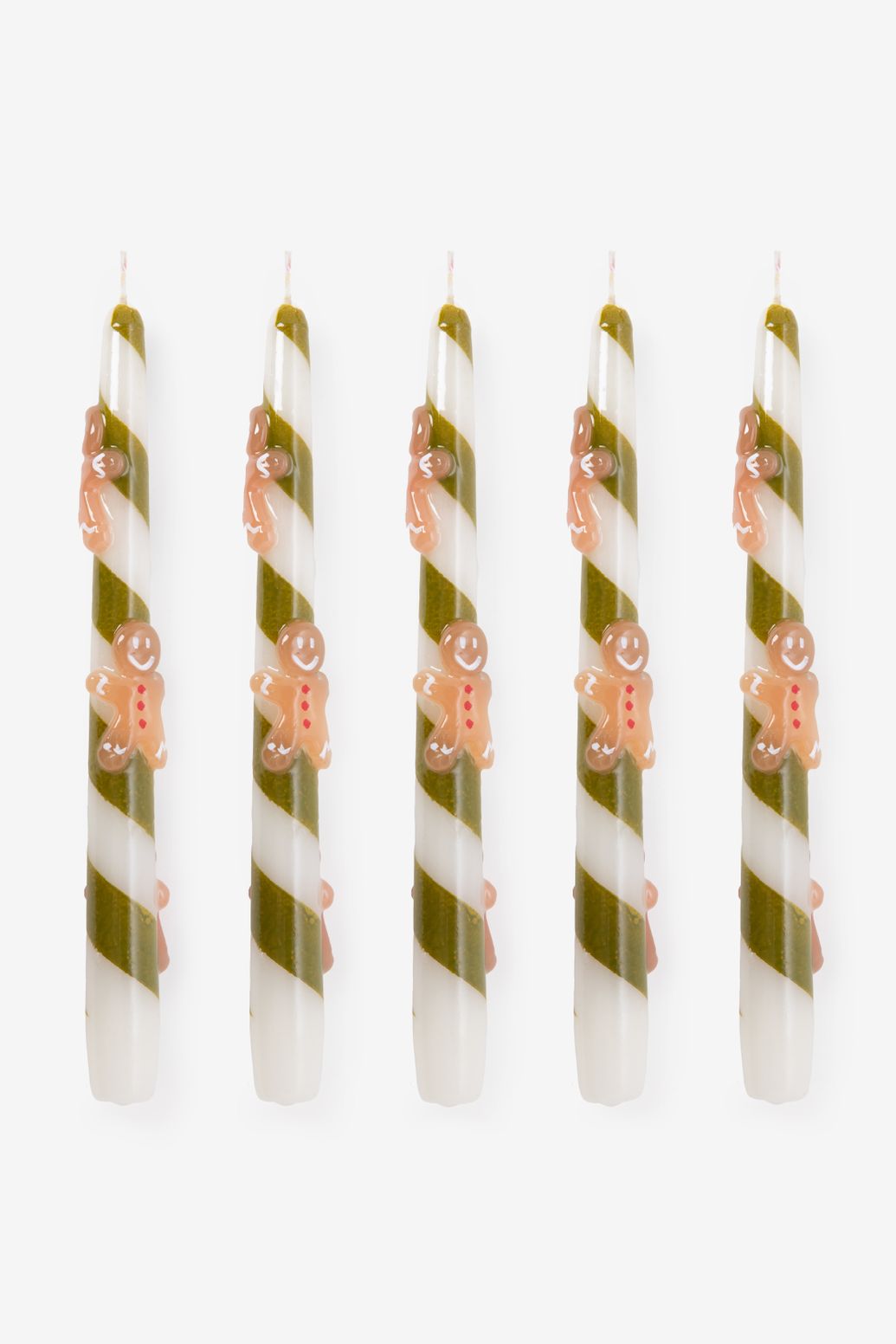 Groene dinerkaars met koekmannetjes