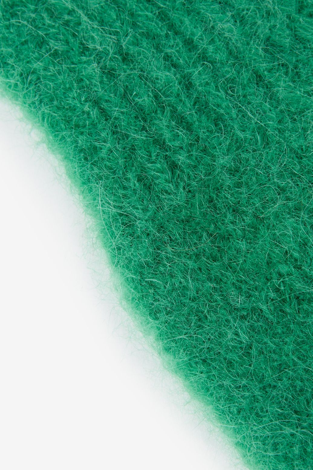 Groene gebreide wanten
